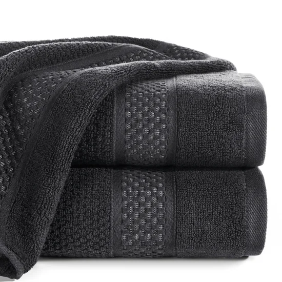 Ręcznik DANNY bawełniany o ryżowej strukturze podkreślony żakardową bordiurą o wypukłym wzorze - 30 x 50 cm - czarny