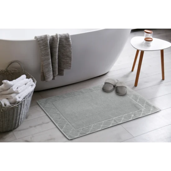 Dywanik łazienkowy MARTHA z bawełny, dobrze chłonący wodę z geometrycznym wzorem wykończony błyszczącą nicią - 50 x 70 cm - szary