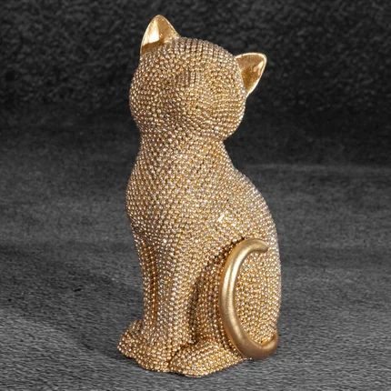 Kot - figurka dekoracyjna ELDO o drobnym strukturalnym wzorze, złota Kot - figurka dekoracyjna ELDO o drobnym strukturalnym wzorze, złota - 7 x 6 x 15 cm