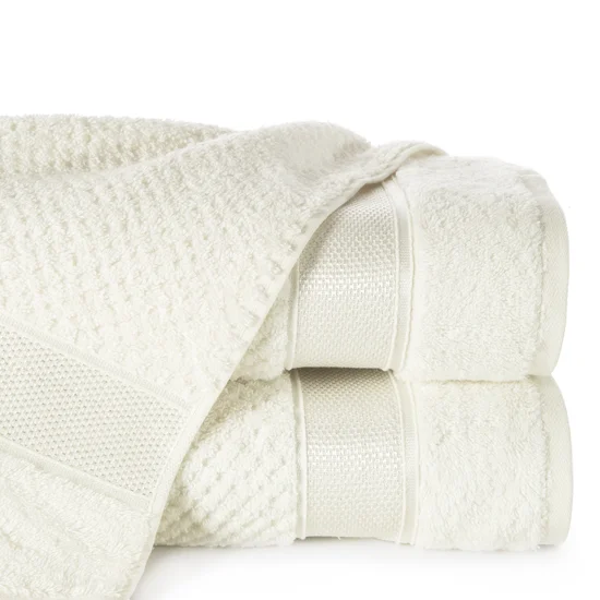 EUROFIRANY PREMIUM Ręcznik MILAN z puszystej bawełny frotte o ryżowej strukturze z błyszczącą bordiurą - 50 x 90 cm - kremowy