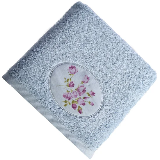 Ręcznik GARDEN z owalną aplikacją z z kwiatami - 50 x 90 cm - niebieski