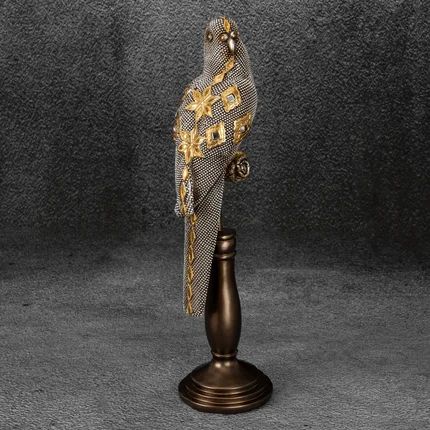 Papuga figurka ceramiczna srebrno-złota Papuga figurka ceramiczna srebrno-złota - 10 x 10 x 35 cm