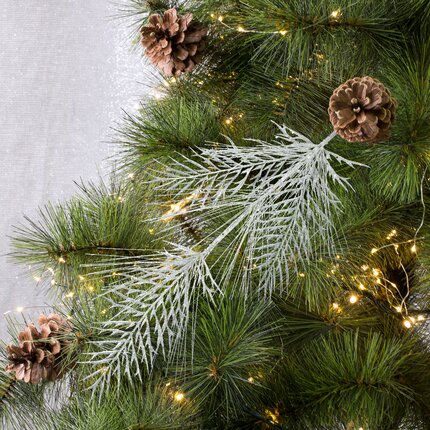 Zimowa gałązka dekoracyjna obsypana srebrnym brokatem 55 x 20 cm srebrny