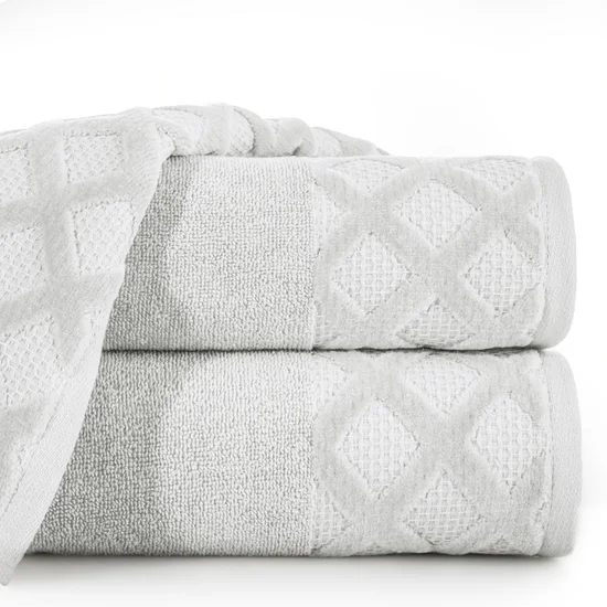 DIVA LINE Ręcznik TOBI w kolorze srebrnym, z żakardową bordiurą z geometrycznym, welurowym wzorem - 70 x 140 cm - srebrny