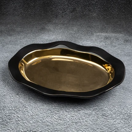 Patera ceramiczna o falującym kształcie czarno-złota Patera ceramiczna o falującym kształcie czarno-złota - 31 x 22 x 4 cm