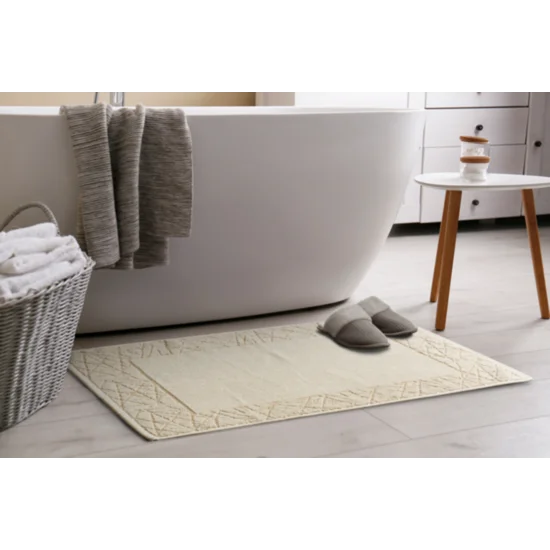 Dywanik łazienkowy NIKA z bawełny, dobrze chłonący wodę z geometrycznym wzorem wykończony błyszczącą nicią - 50 x 70 cm - kremowy