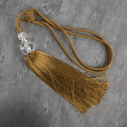 Dekoracyjny sznur IZA do upięć z chwostem z kryształem, styl glamour Dekoracyjny sznur IZA do upięć z chwostem z kryształem, styl glamour - 74 x 35 cm