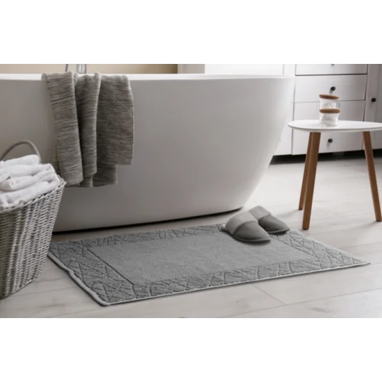 Dywanik łazienkowy NIKA z bawełny, dobrze chłonący wodę z geometrycznym wzorem wykończony błyszczącą nicią - 50 x 70 cm - szary