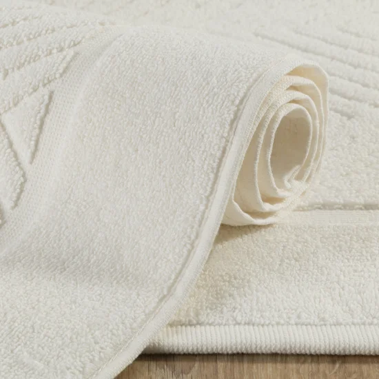 REINA LINE Dywanik łazienkowy z bawełny frotte zdobiony wzorem w zygzaki - 60 x 90 cm - kremowy