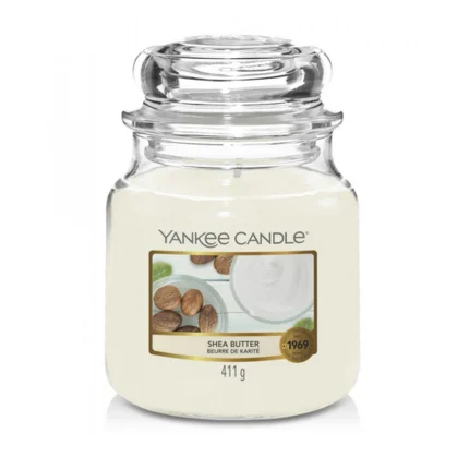 YANKEE CANDLE - Średnia świeca zapachowa w słoiku - Shea Butter YANKEE CANDLE - Średnia świeca zapachowa w słoiku - Shea Butter - ∅ 11 x 13 cm