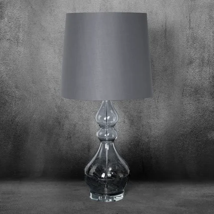 Lampa stołowa TIANA na podstawie ze szkła z abażurem z matowej tkaniny Lampa stołowa TIANA na podstawie ze szkła z abażurem z matowej tkaniny - 32 x 38 x 76 cm