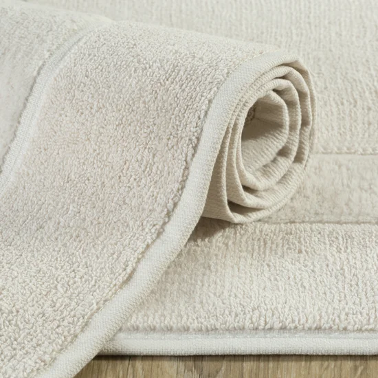 Dywanik łazienkowy z bawełny frotte z welurową bordiurą - 50 x 70 cm - beżowy