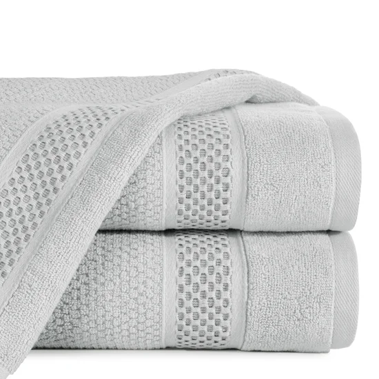 Ręcznik DANNY bawełniany o ryżowej strukturze podkreślony żakardową bordiurą o wypukłym wzorze - 30 x 50 cm - popielaty