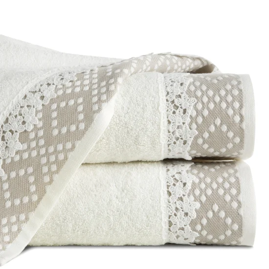Ręcznik z bawełny zdobiony wzorem w zygzaki z gładką bordiurą - 70 x 140 cm - kremowy